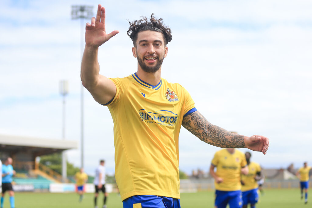 Ollie Hulbert celebrates his goal for Barry Town against Bala Town in the Cymru Premier