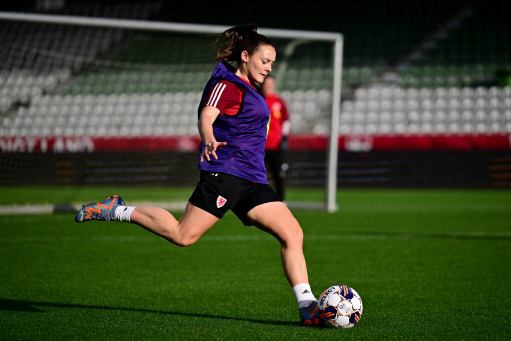 Maria Francis-Jones warms up during a Wales training session