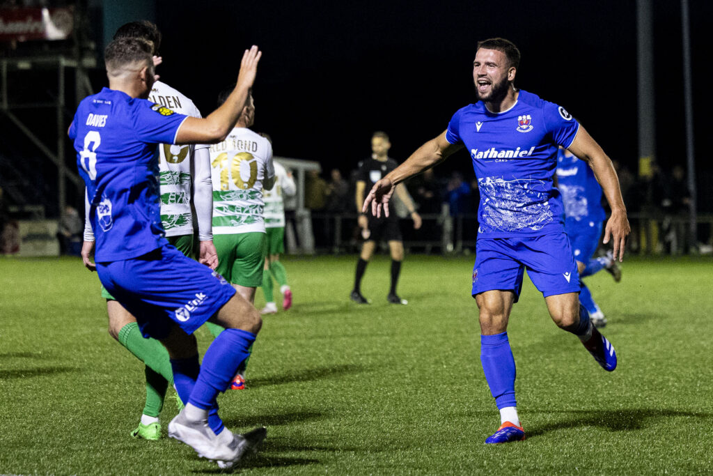 Clayton Green celebrates scoring Penybont's opening goal against TNS