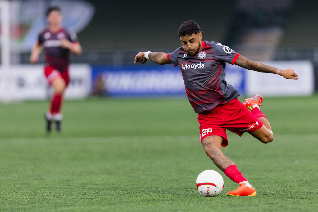 Naim Arsan in action for Bala Town in the UEFA Conference League