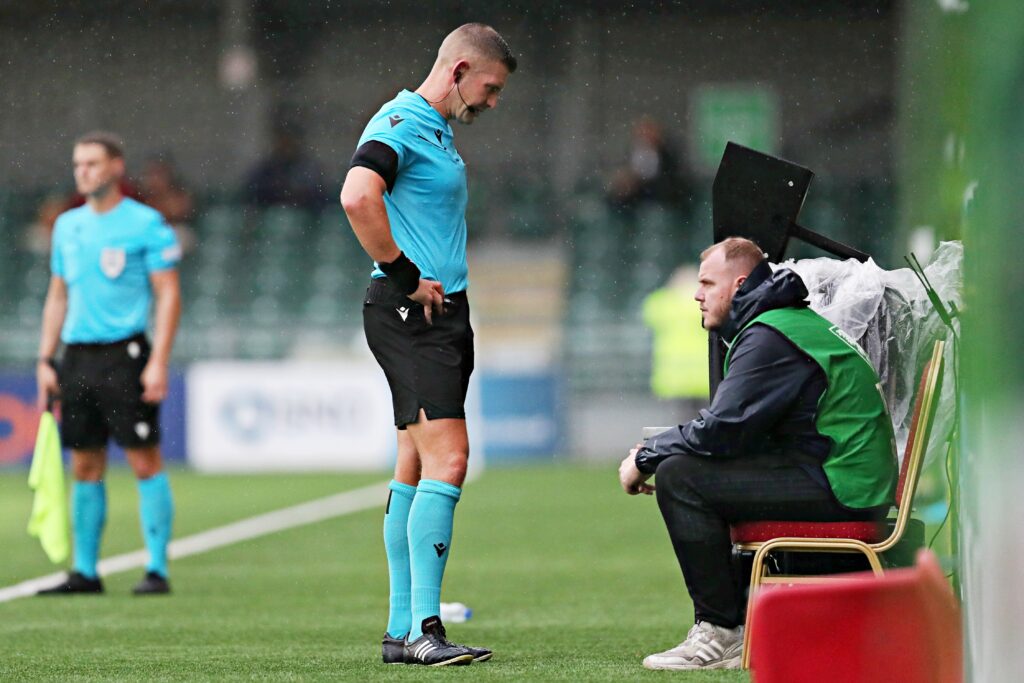 Referee Darren England consults VAR during The New Saints vs Club Sportiv Petrocub Hincesti in the UEFA Europa League Third qualifying round second leg at Park Hall, Oswestry