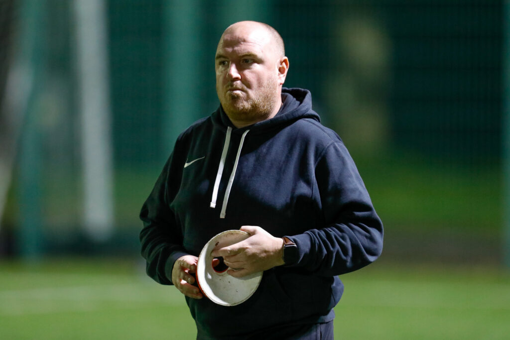 Afan Lido manager Garry Taylor with some cones in his hand ahead of the Cymru South game between Trethomas Bluebirds and Afan Lido.