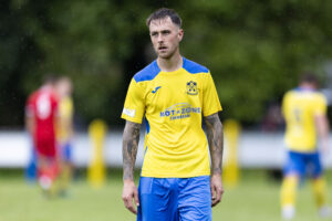 Alex Bonthron in action for Cwmbran Celtic against Trethomas Bluebirds in the Nathaniel MG Cup