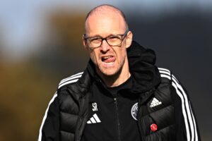 LLANUWCHLLYN, GWYNEDD, WALES - 19th OCTOBER 2024 - Newtown's Cymru Premier manager Scott Ruscoe during CPD Llanuwchllyn vs Newtown AFC in Round 2 of the FAW Welsh Cup at the Village Hall, Llanuwchllyn