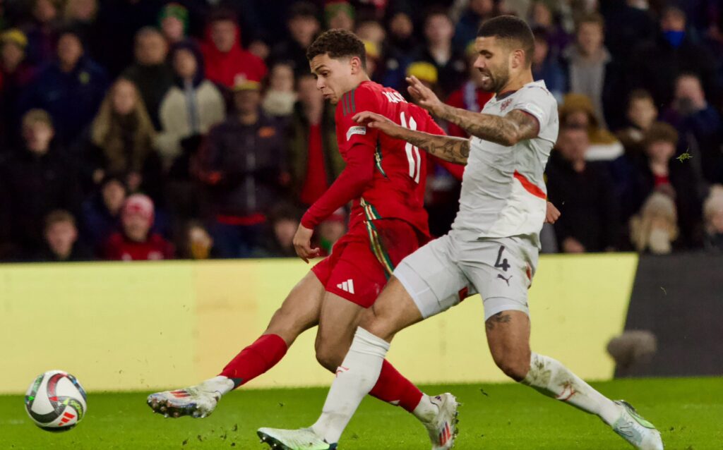 Brennan Johnson of Wales scoring their third goal against Iceland in the UEFA Nations League