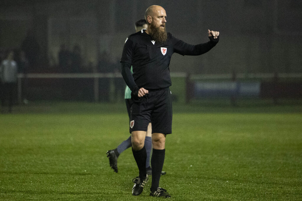 Referee Kris Hames during the first half. 
Afan Lido v Taffs Well in the JD Cymru South at Marston’s Stadium on the 15th December 2023