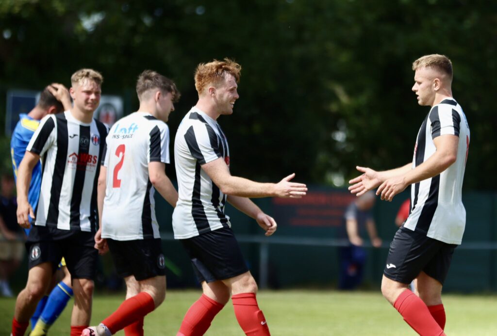 Cardiff Dracs celebrate Sam Cawley's goal against Tonyrefail in the FAW Trophy. 