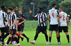 Cardiff Dracs celebrate scoring a goal in the Ardal South West