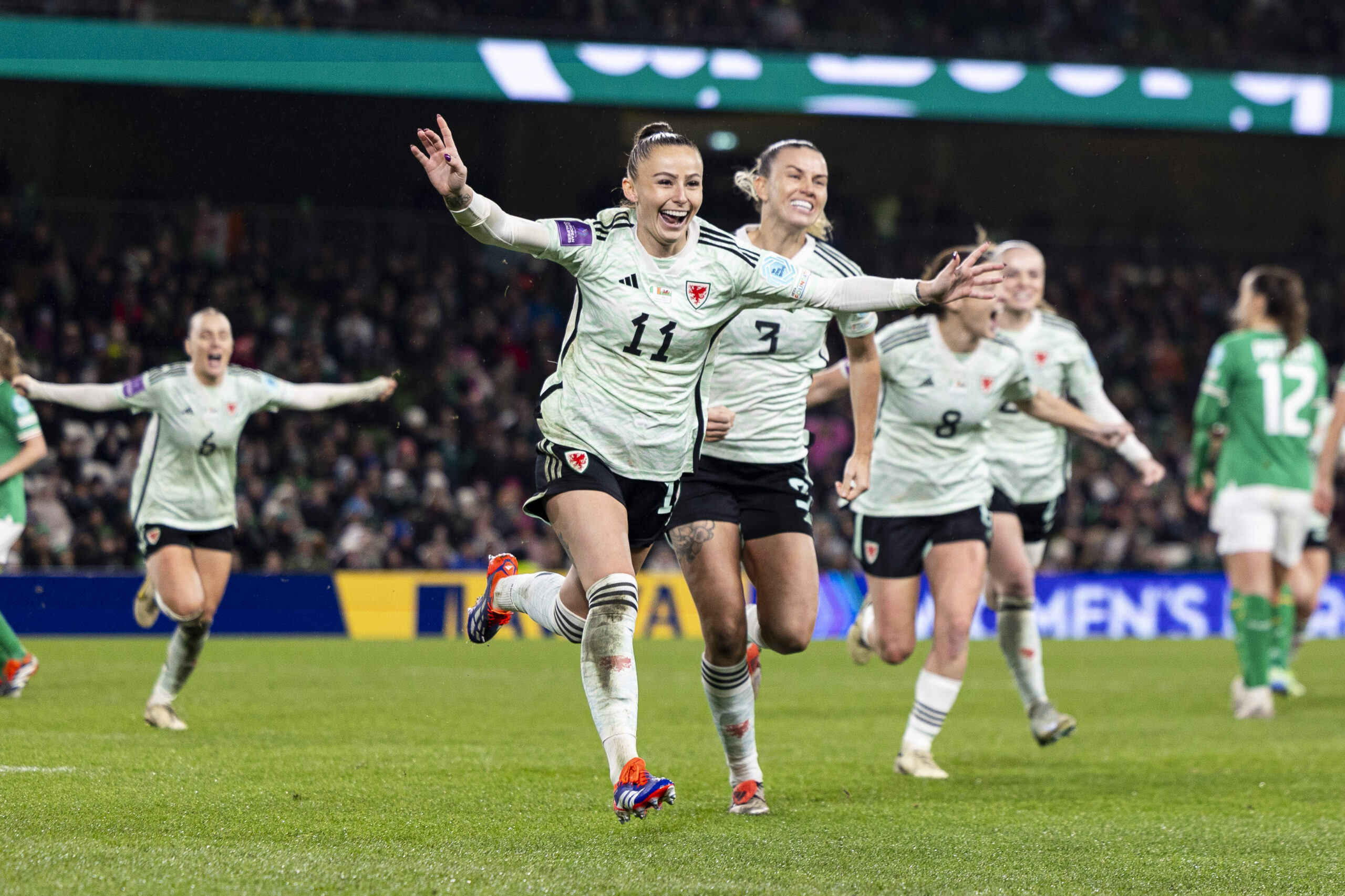 Hannah Cain of Wales celebrates scoring her sides first goal from the penalty spot. Republic of Ireland v Wales in the UEFA Women’s European Qualifiers Play Off Final at the Aviva Stadium on the 3rd December 2024.