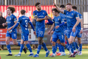 Haverfordwest County's Ben Ahmun scores and celebrates 3-1 during the 2024/25 JD Cymru Premier Championship Conference league fixture between Haverfordwest County AFC & Bala Town FC at The Ogi Bridge Meadow Stadium, Wales