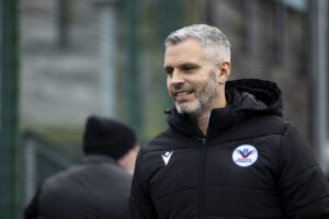 YSTRAD MYNACH, WALES - 28TH DECEMBER 2024: Trethomas Bluebirds manager Mark Dunford ahead of kick off. Trethomas Bluebirds v Carmarthen Town in the JD Cymru South at the Centre For Sporting Excellence on the 28th December 2024