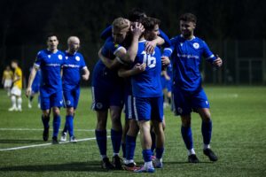 Jack Jones of Trethomas Bluebirds celebrates scoring his sides third goal. Trethomas Bluebirds v Carmarthen Town in the JD Cymru South at the Centre For Sporting Excellence on the 28th December 2024.