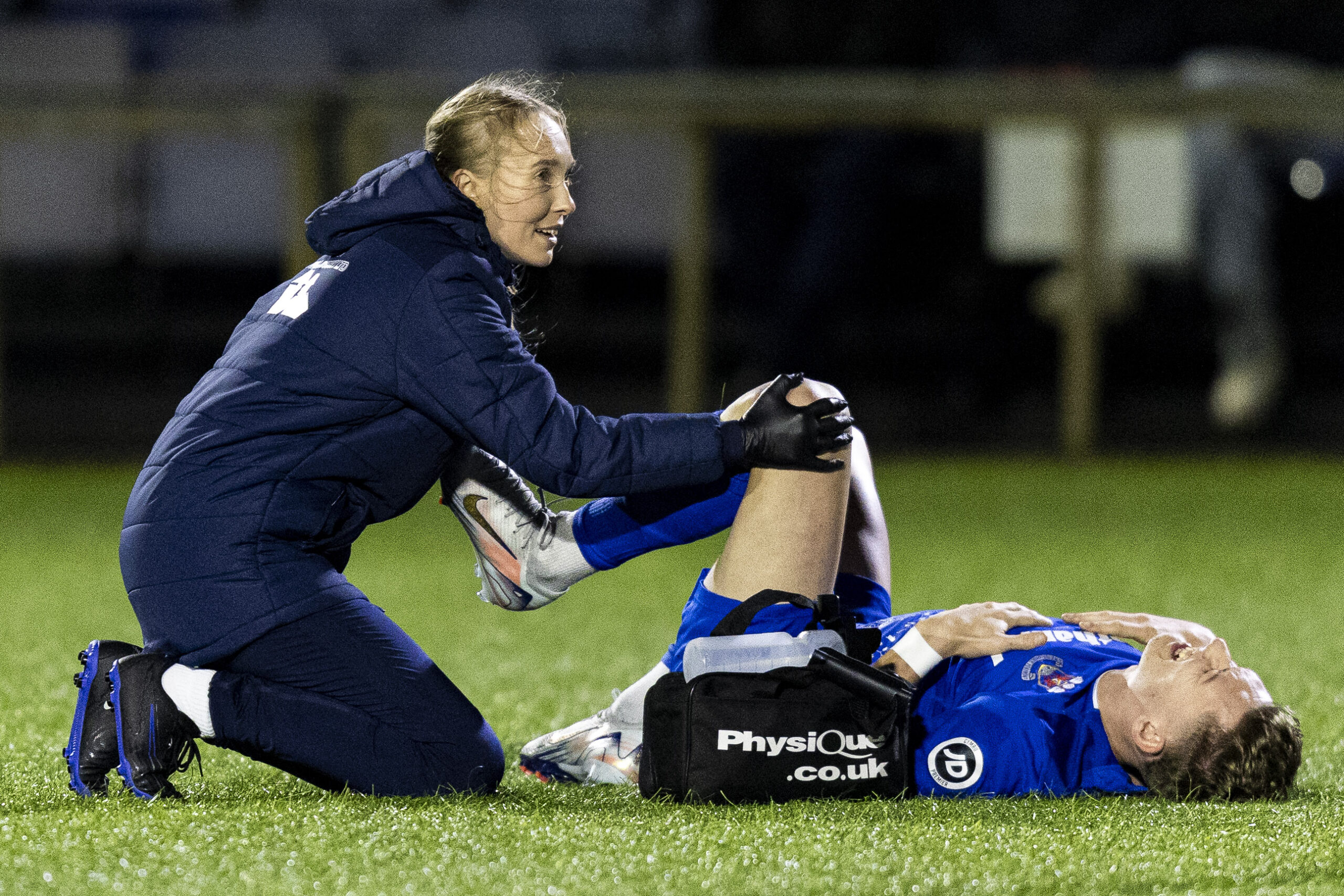 Nathan Wood of Penybont receives treatment. Penybont v Cardiff Metropolitan University in the JD Cymru Premier at the SDM Glass Stadium on the 31st December 2024