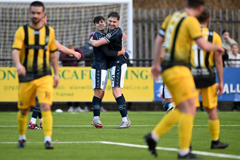 Haverfordwest County's Daniel Hawkins celebrates scoring his sides first goal during the JD Cymru Premier 24/25 Phase 1 match between Haverfordwest County A.F.C and Aberystwyth Town F.C. at Bridge Meadow Stadium in Haverfordwest on the 1st January 2025
