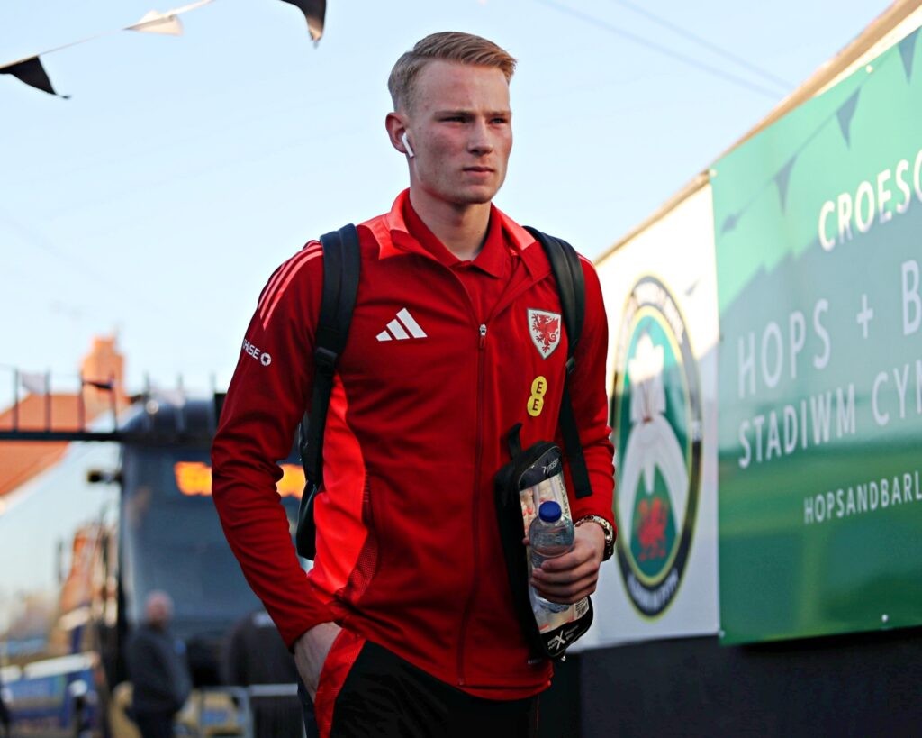 Cardiff City and Wales U19 goalkeeper Luke Armstrong arrives at Rhyl's Belle Vue Stadium.