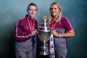 ardiff City Womens' Hannah Power and Cardiff City Womens' Danielle Green poses with trophy after the 2024/25 Bute Energy Welsh Cup Final fixture between Wrexham AFC Women & Cardiff City Women FC at Rodney Parade, Newport, Wale