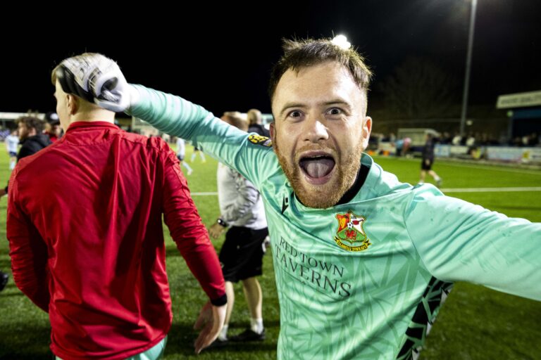 Llanelli Town goalkeeper Scott Coughlan celebrates at full time. Cambrian United v Llanelli Town in the JD Cymru South at the M&P Group 3G on the 4th April 2025