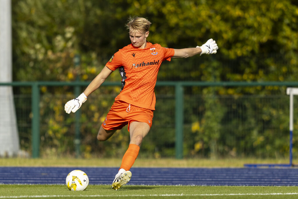 CARDIFF, WALES. - 17TH JULY 2025: 
Penybont goalkeeper Luke Armstrong takes a free kick.
Penybont v Kauno Žalgiris in the UEFA Conference League first qualifying round at Cardiff International Sports Campus on the 17th July 2025. (Pic by Lewis Mitchell/FAW)