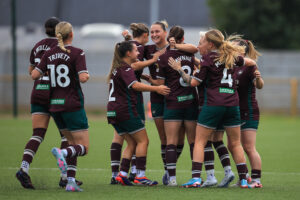 Chloe Chivers of Swansea City Women celebrates after scoring during the 2025/26 Genero Adran Premier league fixture between Barry Town United Women and Swansea City Women at Jenner Park Stadium, Barry, Wales