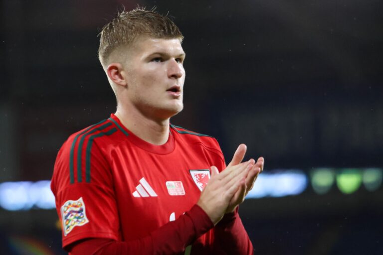 Jordan James claps the Wales fans at the Cardiff City Stadium