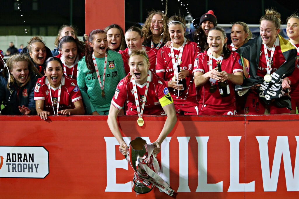 BANGOR, WALES - 22 FEBRUARY 2026: Wrexham celebrate winning the 2025/2026 Genero Adran Trophy final between Wrexham AFC Women & Cardiff City Women FC at Bangor City Stadium, Bangor, Wales
