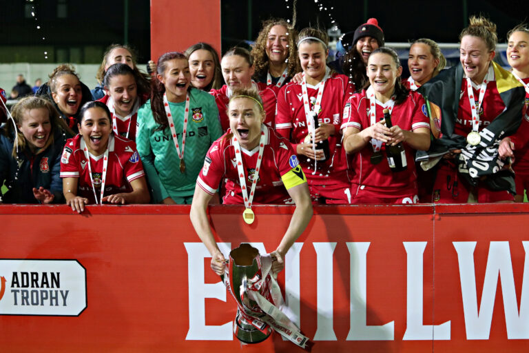 BANGOR, WALES - 22 FEBRUARY 2026: Wrexham celebrate winning the 2025/2026 Genero Adran Trophy final between Wrexham AFC Women & Cardiff City Women FC at Bangor City Stadium, Bangor, Wales