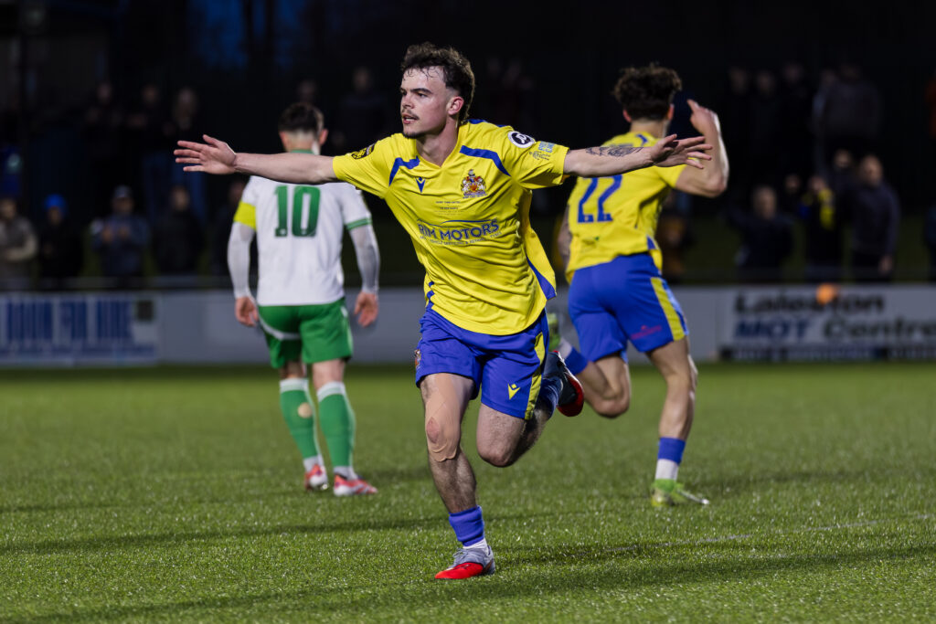 BRIDGEND, WALES - 28 FEBRUARY 2026:  Barry Town's Ieuan Owen scores and celebrates 0-1 during the 2025/26 Nathaniel MG Cup Final fixture between The New Saints FC & Barry Town United AFC at the Dragonbet Stadium, Bridgend, Wales