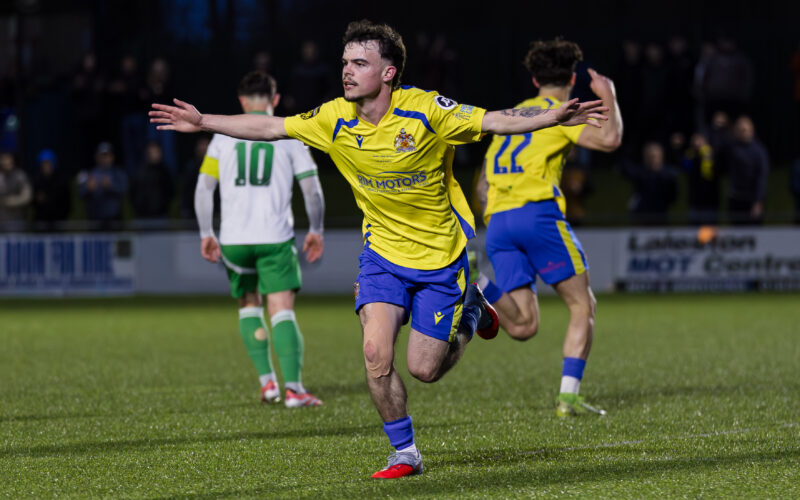 BRIDGEND, WALES - 28 FEBRUARY 2026: Barry Town's Ieuan Owen scores and celebrates 0-1 during the 2025/26 Nathaniel MG Cup Final fixture between The New Saints FC & Barry Town United AFC at the Dragonbet Stadium, Bridgend, Wales