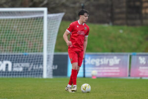LLANELLI, WALES - 01 JANUARY 2026:James Lester of Llanelli Town during the JD Cymru Premier 2025/26 fixture Llanelli Town vs Penybont at Stebonheath Park, Llanelli, Wales