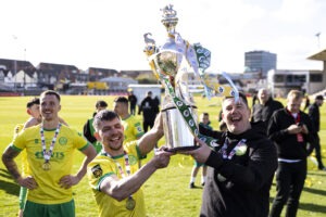 NEWPORT, WALES - 12 APRIL 2026: Caernarfon Town's Darren Thomas & Caernarfon Town manager Richard Davies during 2025/26 JD FAW Welsh Cup Final fixture between Caernarfon Town F.C & Flint Town United F.C at Rodney Parade, Newport, Wales