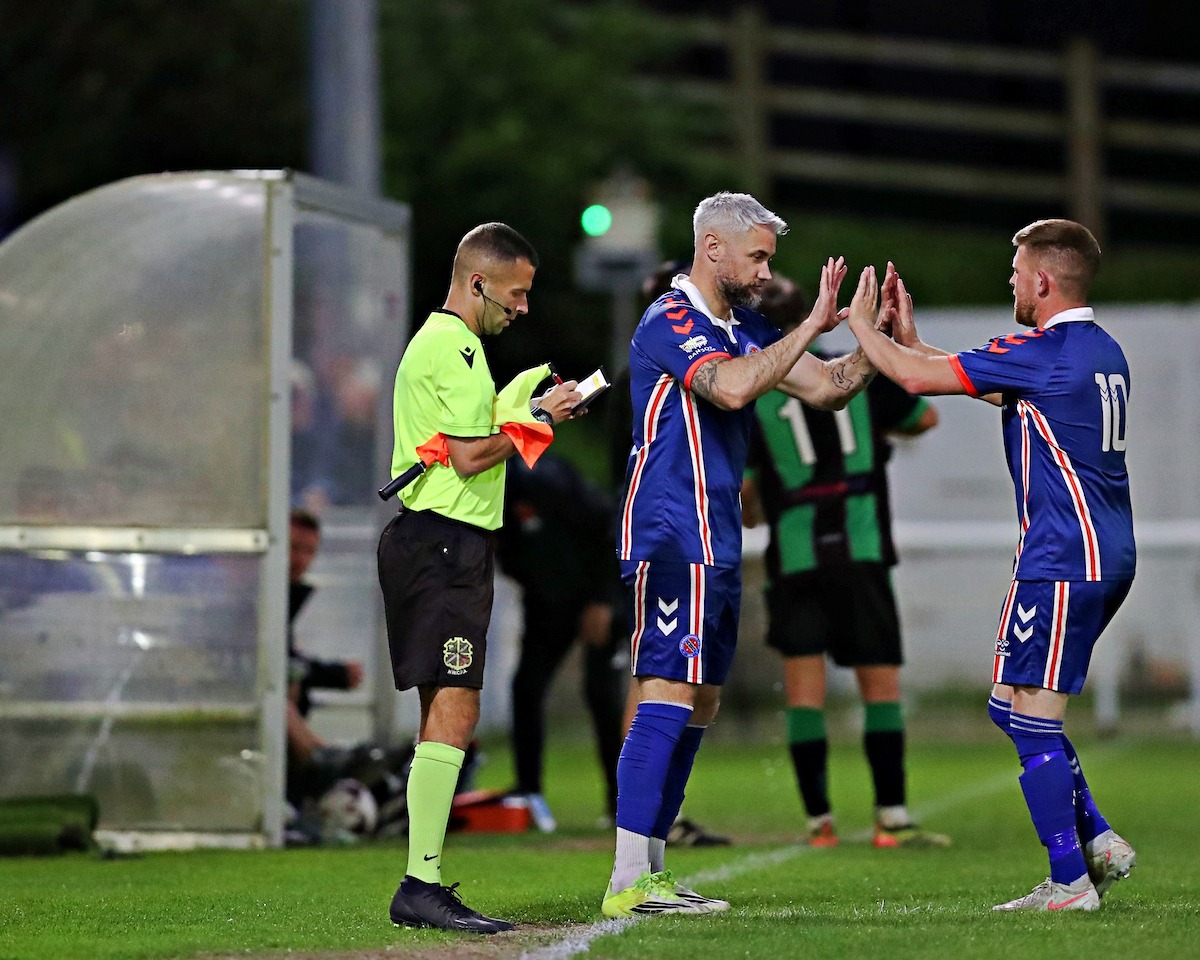 BANGOR, GWYNEDD, WALES - 29th APRIL 2026 - Jamie Reed of CPD Dinas Bangor 1876 replaces Corrig McGonigle of CPD Dinas Bangor 1876 during CPD Dinas Bangor 1876 vs Penmaenmawr Phoenix in Round 26 at Bangor City Stadium, Bangor