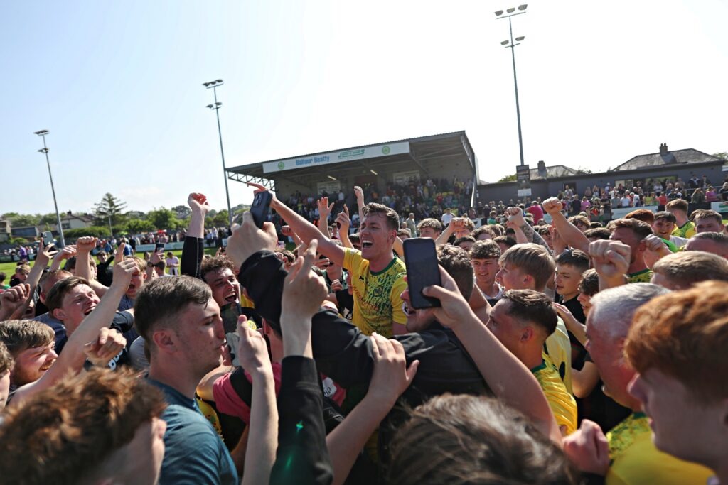 CAERNARFON, GWYNEDD, WALES - 18th MAY 2024 - Caernarfon fans celebrate after Caernarfon Town vs Penybont FC in the JD Cymru European Play-Off Final at The Oval, Caernarfon