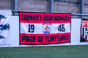 FLINT, WALES - 21ST DECEMBER 2025: Connah’s Quay Nomads flag ahead of the JD Cymru Premier fixture between Connah’s Quay Nomads and Briton Ferry Llansawel at the Essity Stadium, Flint. 21st of December, Flint, Wales