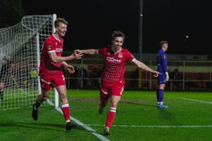 Kian Jenkins of Briton Ferry Llansawel scores to make it 2-1 during the JD Cymru Premier 2025/26 - Play-Off Conference fixture Briton Ferry Llansawel vs Llanelli Town at The Renewable Centre Stadium, Briton Ferry, Wales (Pic by Jamie Edwards)