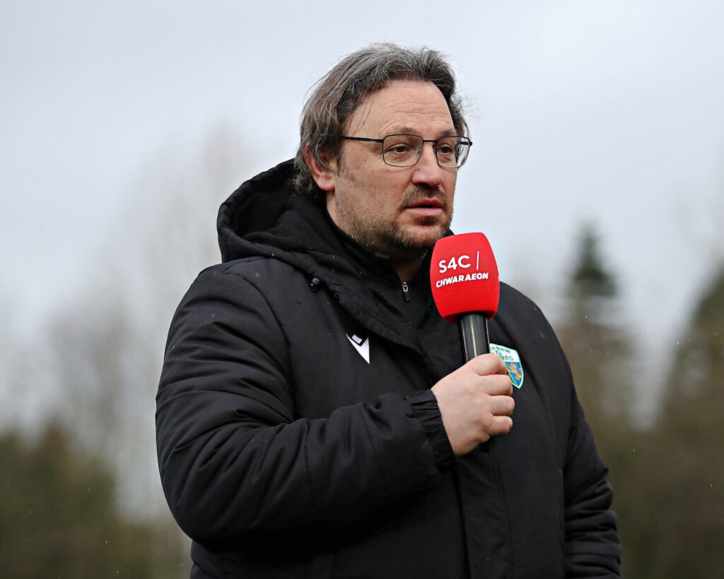OSWESTRY, SHROPSHIRE, ENGLAND - 7th FEBRUARY 2026 - Craig Harrison, Manager of The New Saints F.C. is interviewed by Sgorio after The New Saints vs Penybont FC in Round 2 of the JD Cymru Premier Championship Conference at Park Hall, Oswestry