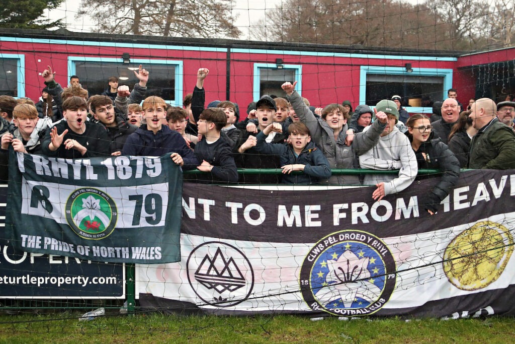 Cymru North side Rhyl fans after the JD Welsh Cup Semi-Final between Rhyl 1879 and Caernarfon Town at The Blue Turtle Arena in Colwyn Bay