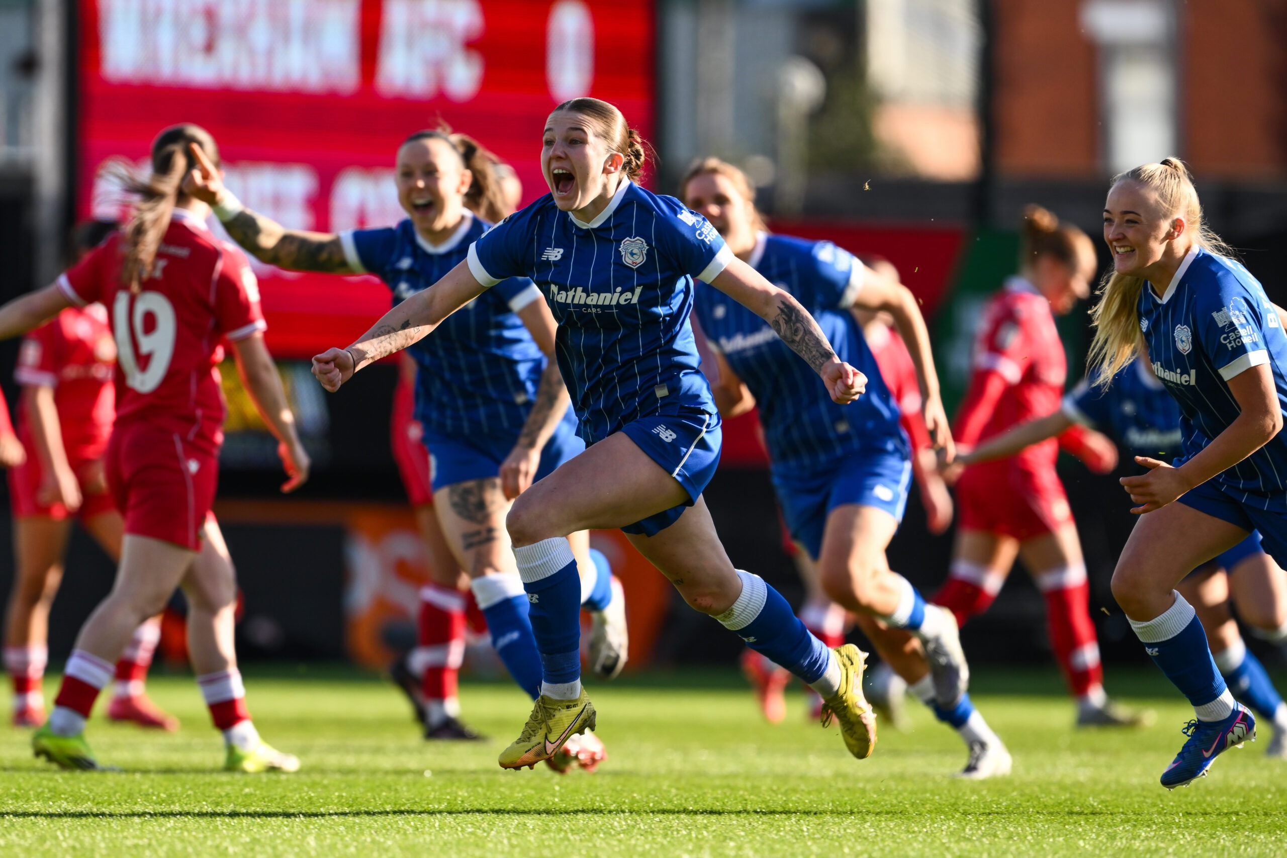Mikayla Cook of Cardiff City Women celebrates her goal to make it 0-1 during the Genero Adran Premier game between Wrexham and Cardiff City at Stok Cae Ras