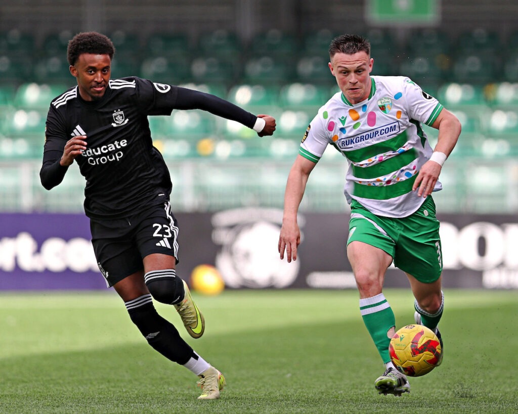 Abdi Sharif of Connah's Quay Nomads pressures Jordan Marshall of The New Saints F.C. during The New Saints vs Connah's Quay Nomads in Round 9 of the JD Cymru Premier Championship Conference at Park Hall, Oswestry