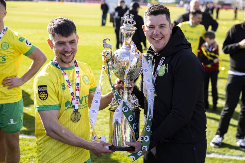 NEWPORT, WALES - 12 APRIL 2026: Caernarfon Town's Darren Thomas & Caernarfon Town manager Richard Davies during 2025/26 JD FAW Welsh Cup Final fixture between Caernarfon Town F.C & Flint Town United F.C at Rodney Parade, Newport, Wales