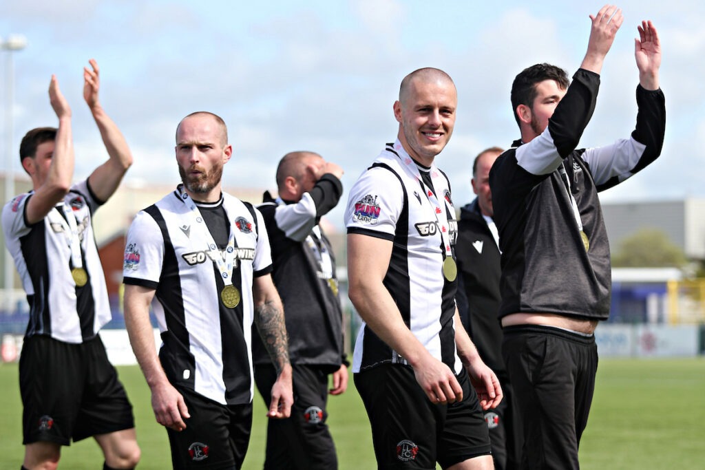 Ross Weaver of Llandudno FC celebrates after Airbus UK Broughton vs Llandudno FC in Round 30 of the JD Cymru North at the Hollingsworth Group Stadium, Broughton