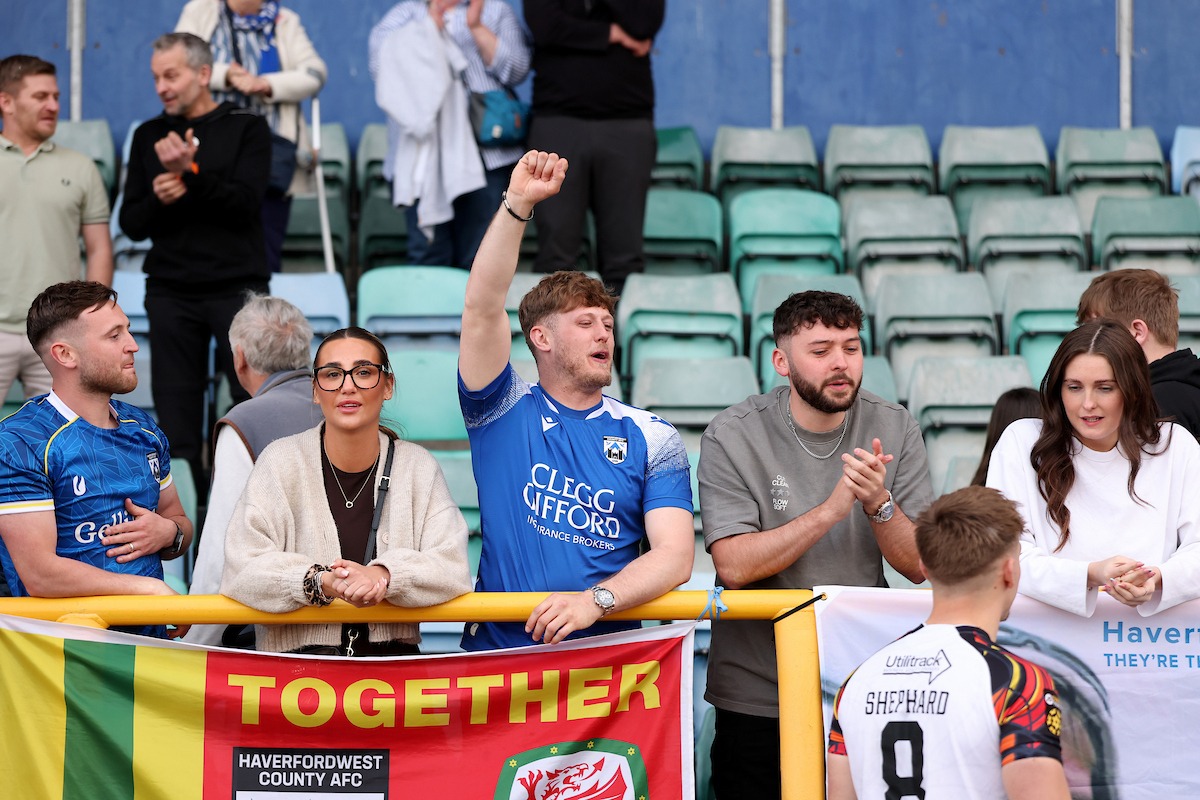 Haverfordwest County's fans during the JD Cymru Premier 25/26 European Play-Off match between Barry Town United and Haverfordwest County AFC at Jenner Park Stadium in Barry on the 26th April 2026