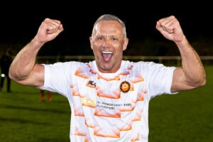 Cwmbran Town striker Lee Trundle celebrates after winning promotion with Pure Swansea