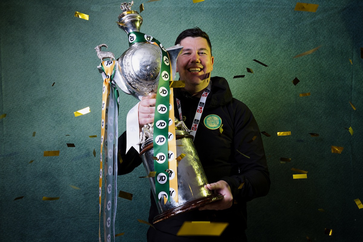 NEWPORT, WALES - 12 APRIL 2026: Caernarfon Town manager Richard Davies celebrates with the trophy after winning the 2025/26 JD FAW Welsh Cup Final fixture between Caernarfon Town F.C & Flint Town United F.C at Rodney Parade, Newport, Wales