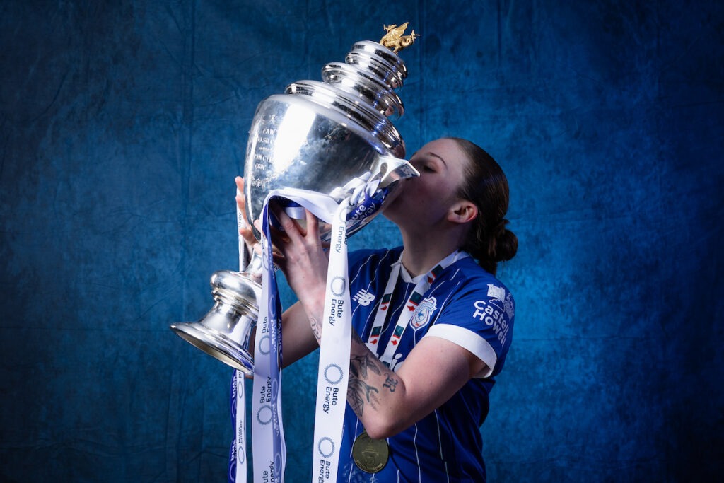 Cardiff City Womens' Mikayla Cook as Cardiff players and staff celebrate with the trophy after winning the 2025/26 Bute Energy Welsh Cup Final fixture between Cardiff City Women FC & Swansea City Women FC at Rodney Parade
