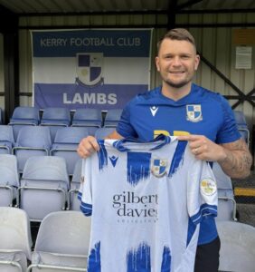 Jamie Breese poses with a Kerry shirt, a club in the Ardal Leagues North East