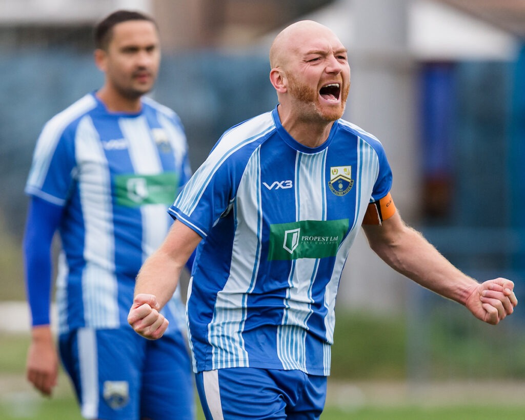 PORT TALBOT, WALES - 18 OCTOBER 2025: Port Talbot's Sam Baker celebrates at the end of the game during round 2 of the 2025/26 JD Welsh Cup  fixture between Port Talbot Town FC & Afan Lido FC, Victoria Road, Port Talbot, Wales.