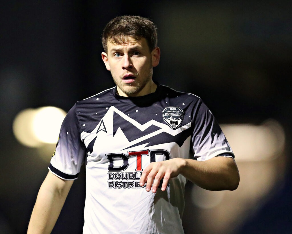 Dom Maher of Flint Mountain FC during Gresford Athletic vs Flint Mountain FC in Round 23 of the JD Cymru North at the Hollingsworth Group Stadium, Broughton