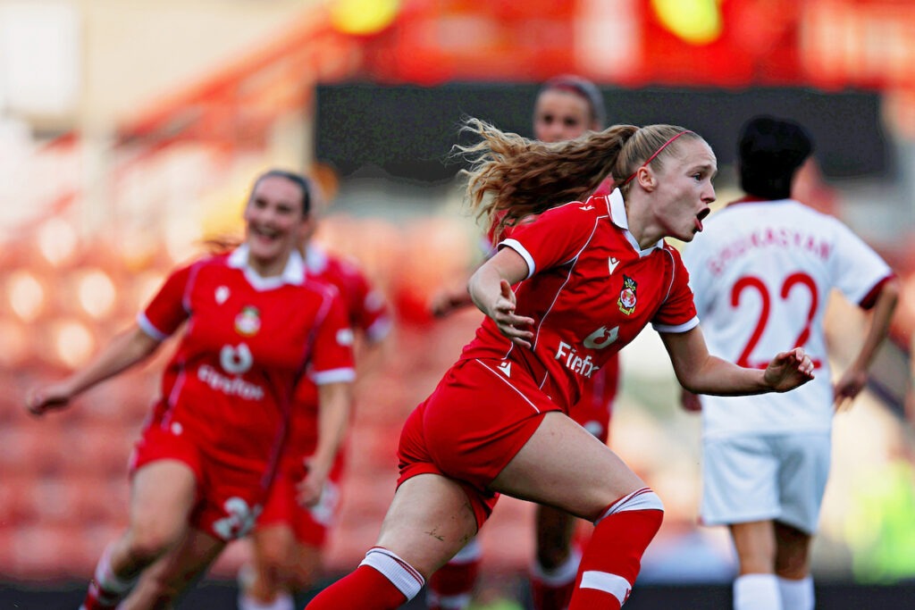 Katie Barker of Wrexham AFC Women celebrates her goal during the UEFA Women’s Champions’ League First Qualifying Round Semi Final fixture between FC Pyunik and Wrexham AFC Women at The Racecourse Ground, Wrexham, Wales. 22nd of July
