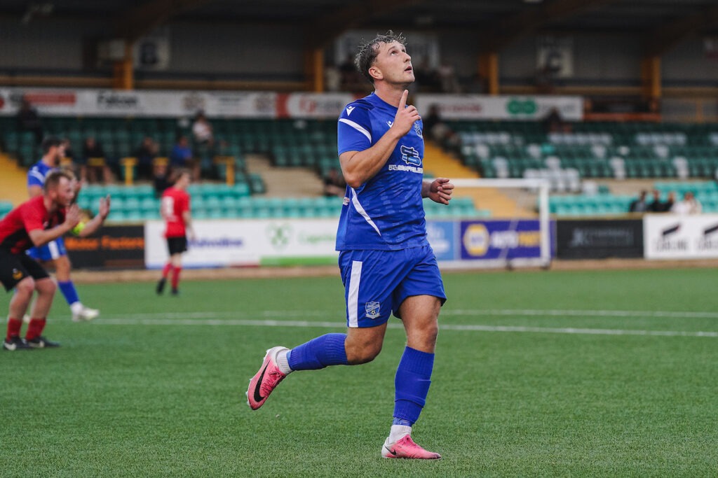 Oliver Jay Amos of Cardiff Airport celebrating his second goal of the match during the FAW Welsh Cup 2026/27 - Qualifying Round fixture Cardiff Airport vs Felinfach FC at Jenner Park, Barry, Wales