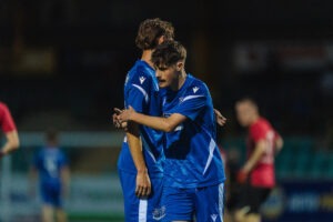 Kieran Neil of Cardiff Airport gets the 6th goal of the game during the FAW Welsh Cup 2026/27 - Qualifying Round fixture Cardiff Airport vs Felinfach FC at Jenner Park, Barry, Wales